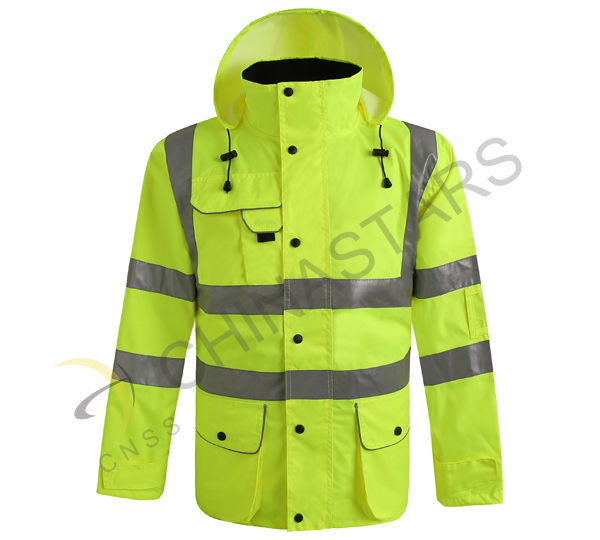 Rain does not stop the cyclists with reflective raincoat